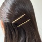 Pince cheveux lisette fine avec boules doré 6.5cm Pince cheveux lisette fine avec boules doré 6.5cm