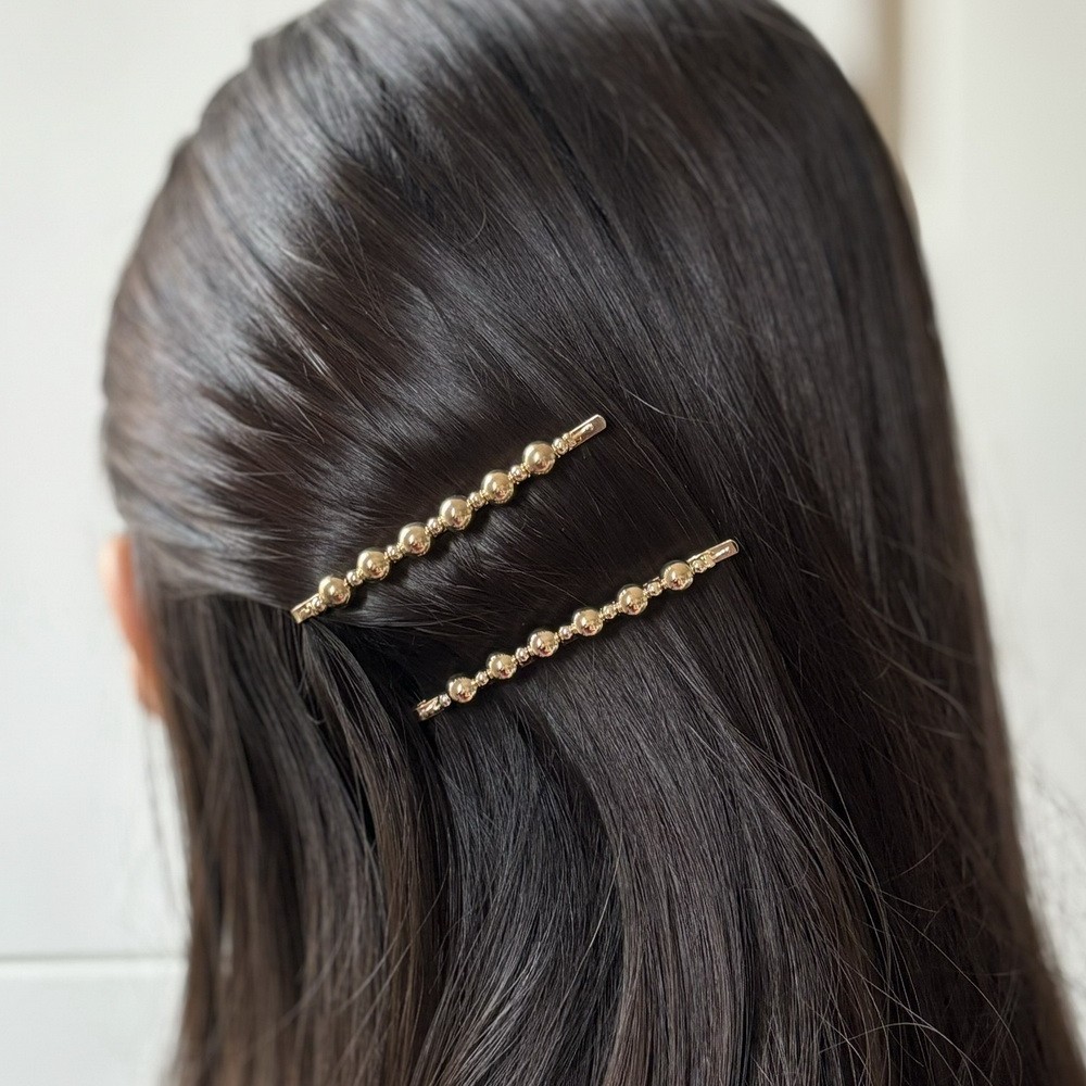 Pince barrette cheveux avec boules en métal doré 6.5cm Pince barrette cheveux avec boules en métal doré 6.5cm
