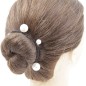 Elastique cheveux ou bracelet noir avec perles nacrées Elastique cheveux ou bracelet noir avec perles nacrées