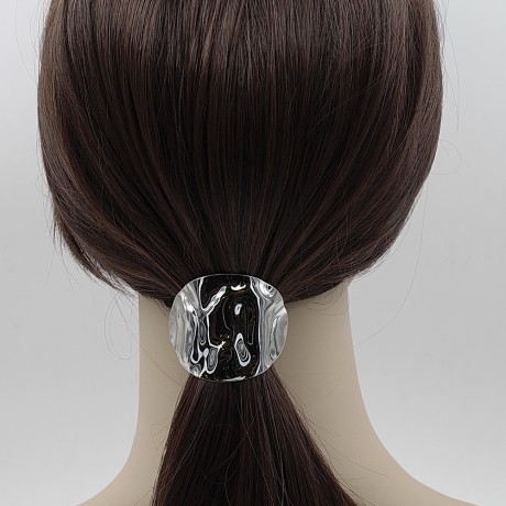 Barrette attache cheveux décorative à poser par dessus un élastique.