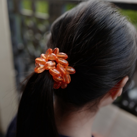 Elastique cheveux ou bracelet perles ovale transparente - orange