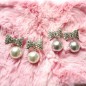Boucle d'oreille pendante noeud et perle - nacré Boucle d'oreille pendante noeud et perle - nacré