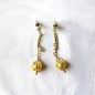 Boucle d'oreille pendante - doré