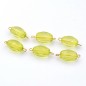 Lot de 6 perles ovales à facette acrylique - jaune vert Lot de 6 perles ovales à facette acrylique - jaune vert