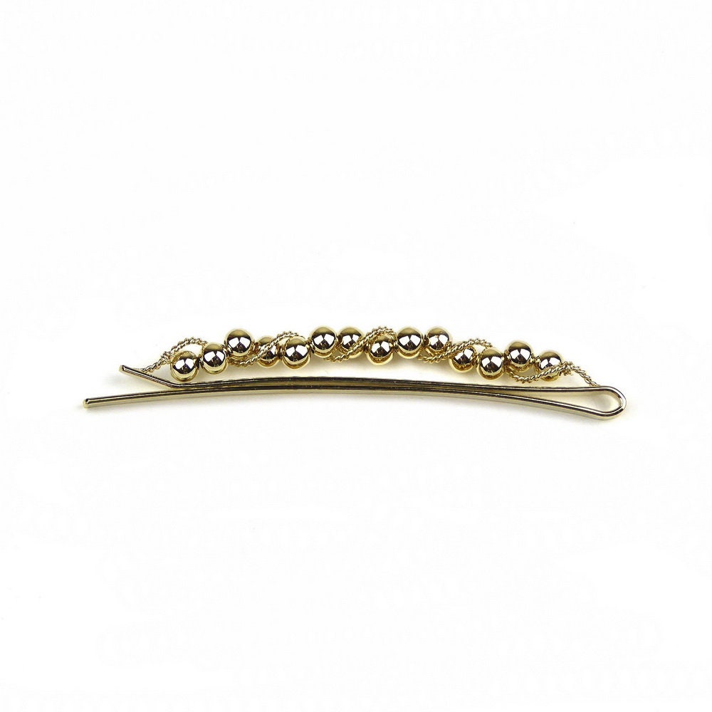 Pince cheveux motif torsadé et perles rondes dorées