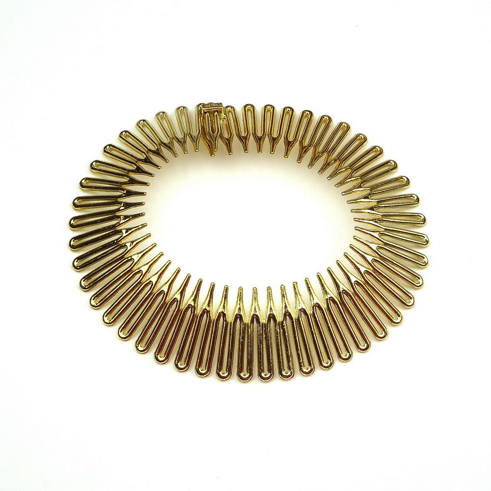 Serre tête souple zigzag doré