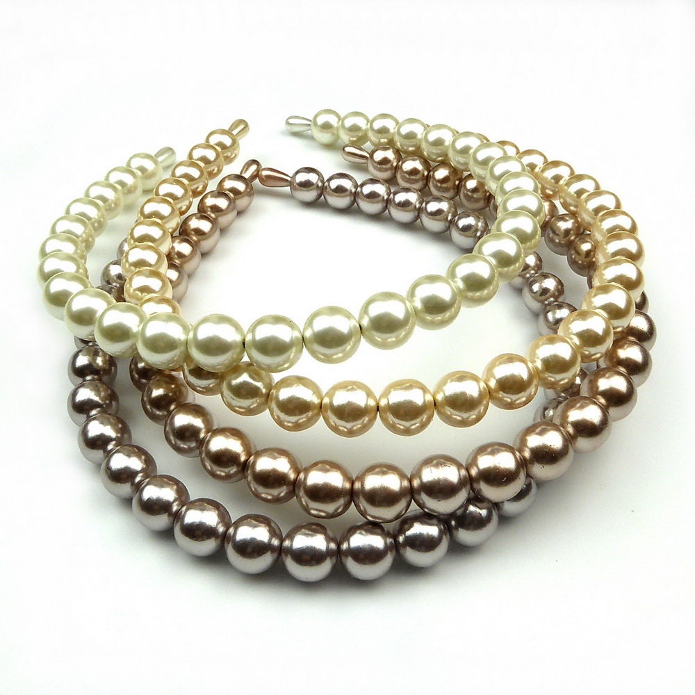 Serre tête couronne en grosses perles nacrées