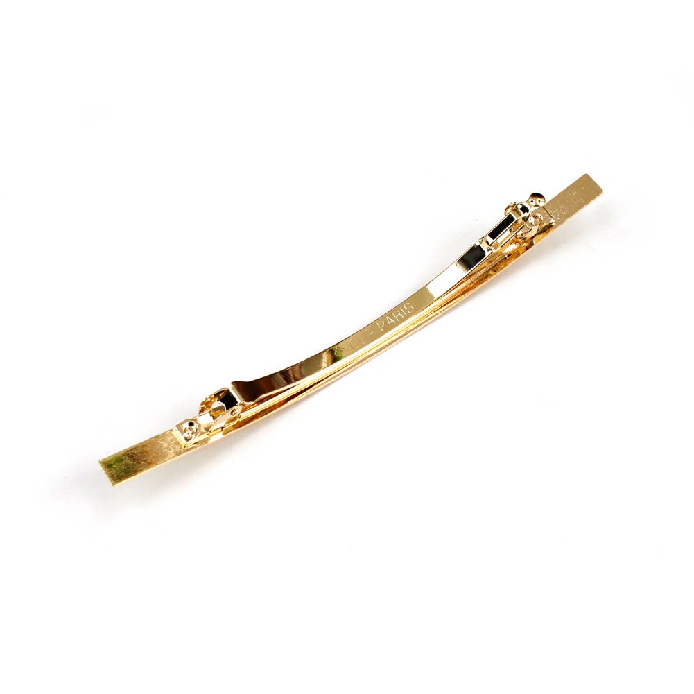 Barrette fine longue en métal strié