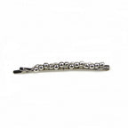 Pince cheveux fine motif torsadé et perles argentées