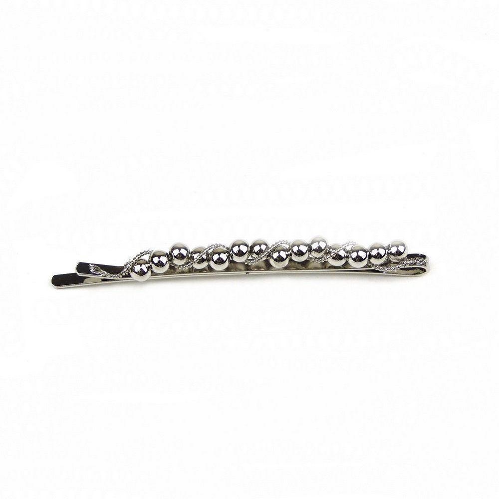 Pince cheveux fine motif torsadé et perles argentées