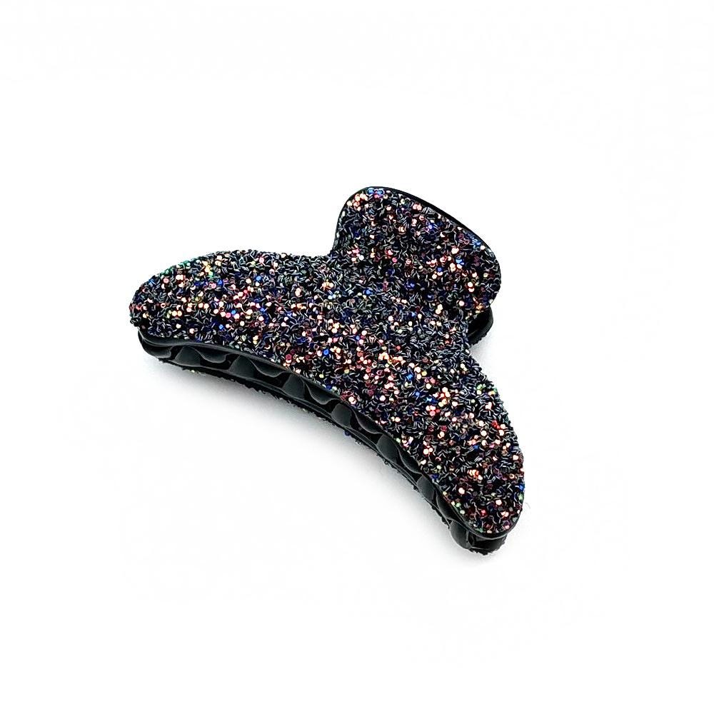 Pince cheveux crabe ornée de paillettes scintillantes violet