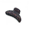Pince cheveux crabe ornée de paillettes scintillantes violet