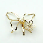 Barrette attache cheveux décorative papillon et perle