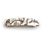 Barrette métal design martelé