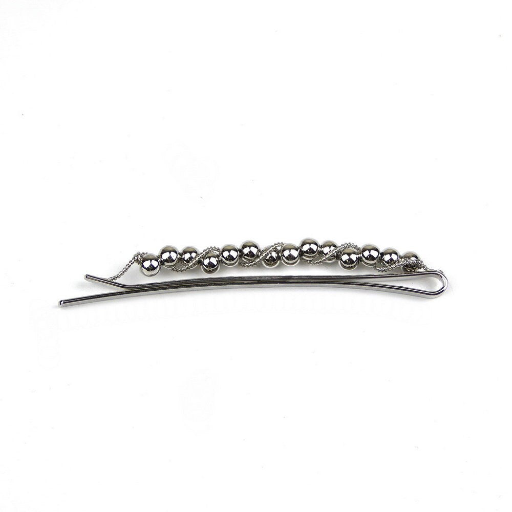 Pince à cheveux fine motif torsadé et perles argentées