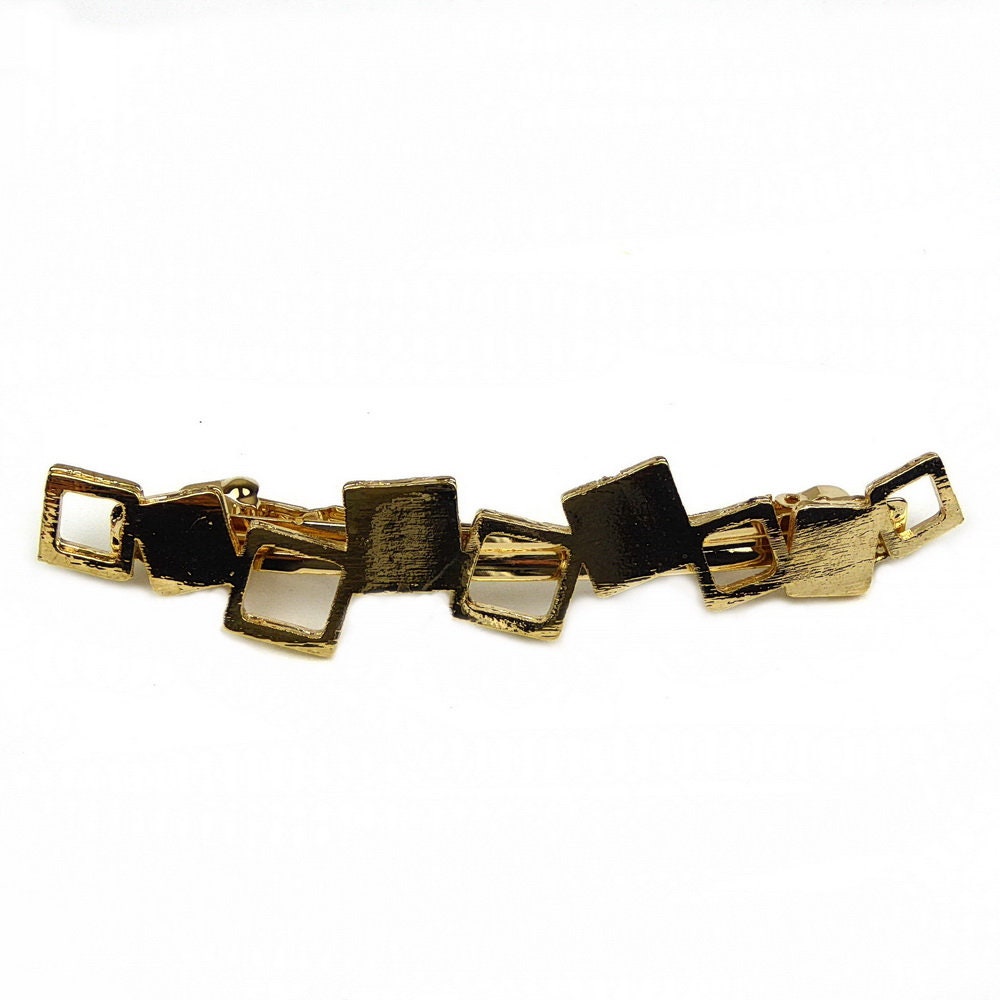Barrette cheveux géométrique doré brossé
