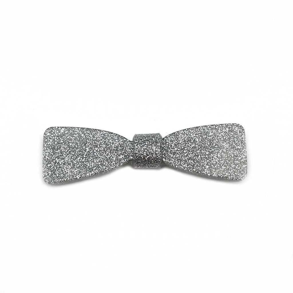 Barrette cheveux acetate incrustée de paillette argenté en forme de nœud