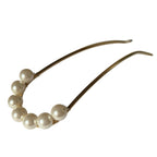 Élégant pic à chignon orné de perles délicates