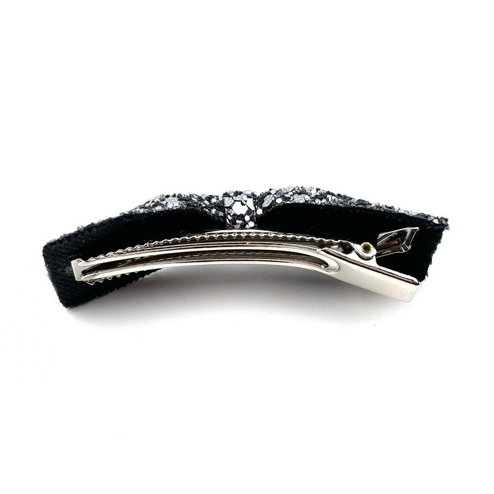 Pince cheveux noeud paillette argenté 6.5cm design glamour