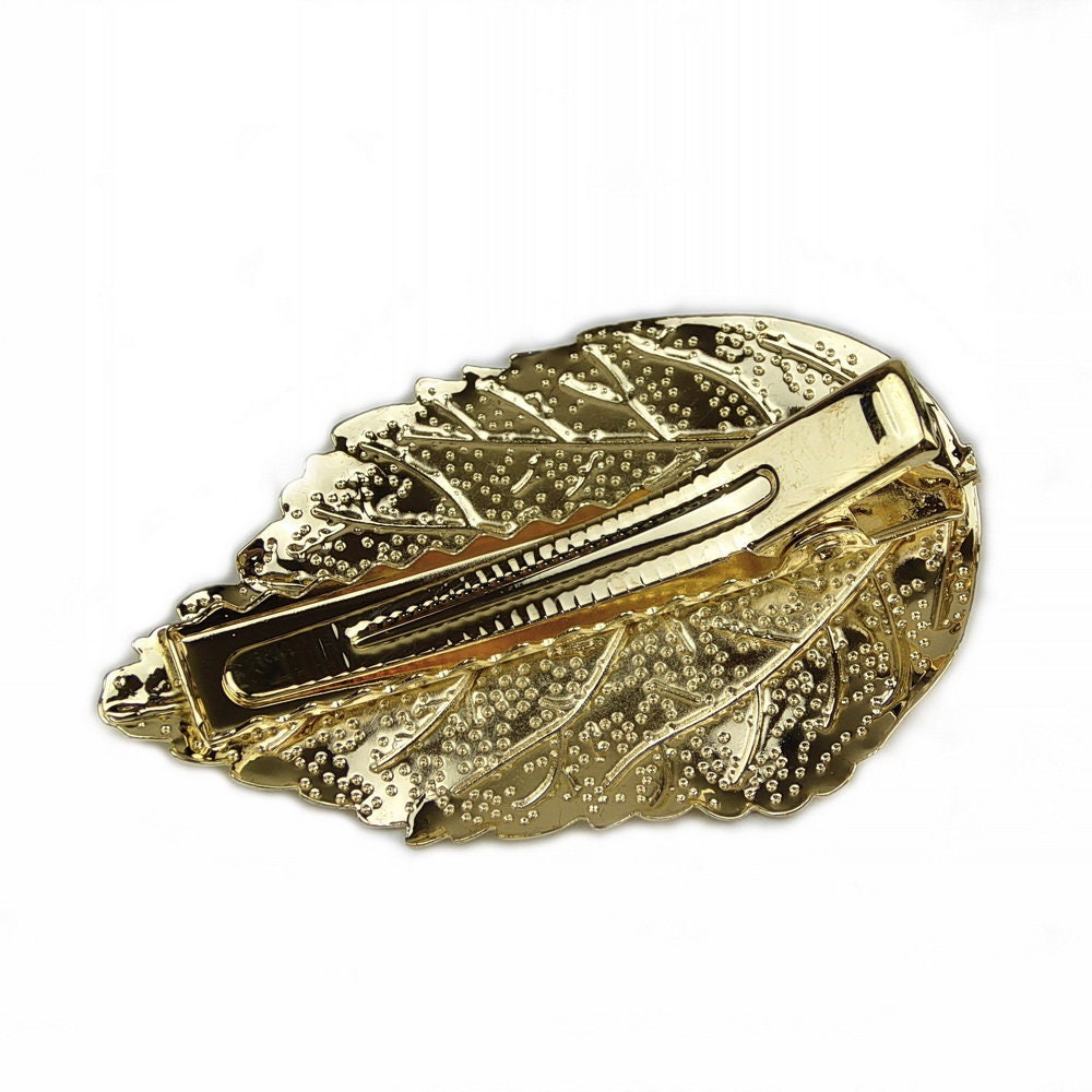 Pince cheveux forme feuille métal doré 5cm