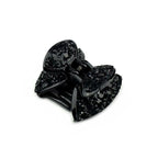 pince cheveux forme nœud ornée de paillettes noires