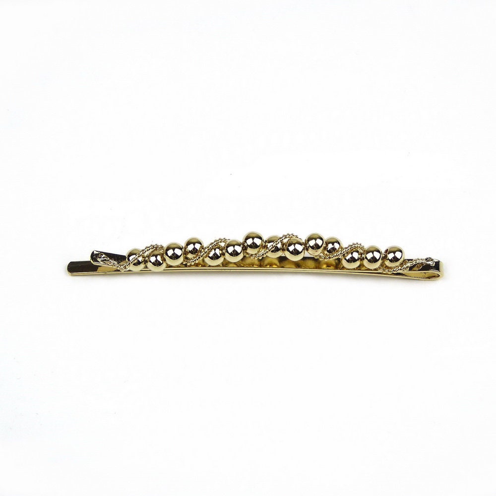 Pince cheveux fine motif torsadé et perles dorées