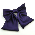 barrette cheveux ornée d'un nœud à pan en satin marine