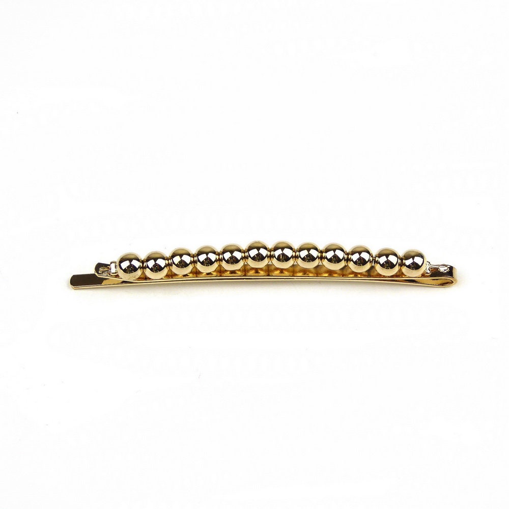 Pince cheveux fine avec boules doré 6.5cm