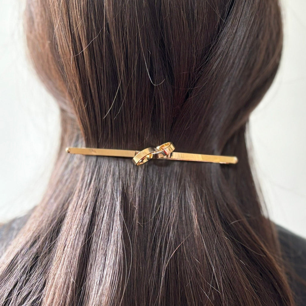 Barrette cheveux longue motif entrelacé doré