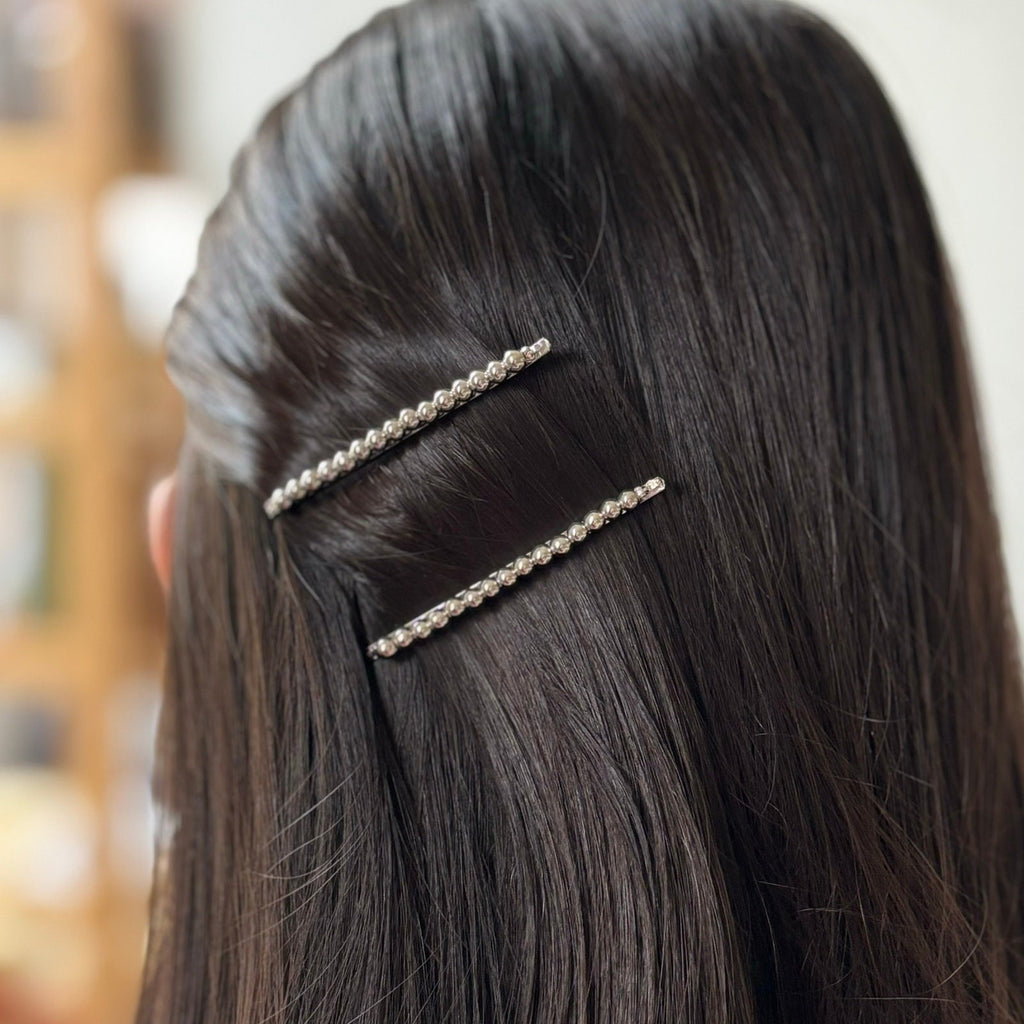 Pince cheveux fine motif torsadé et perles