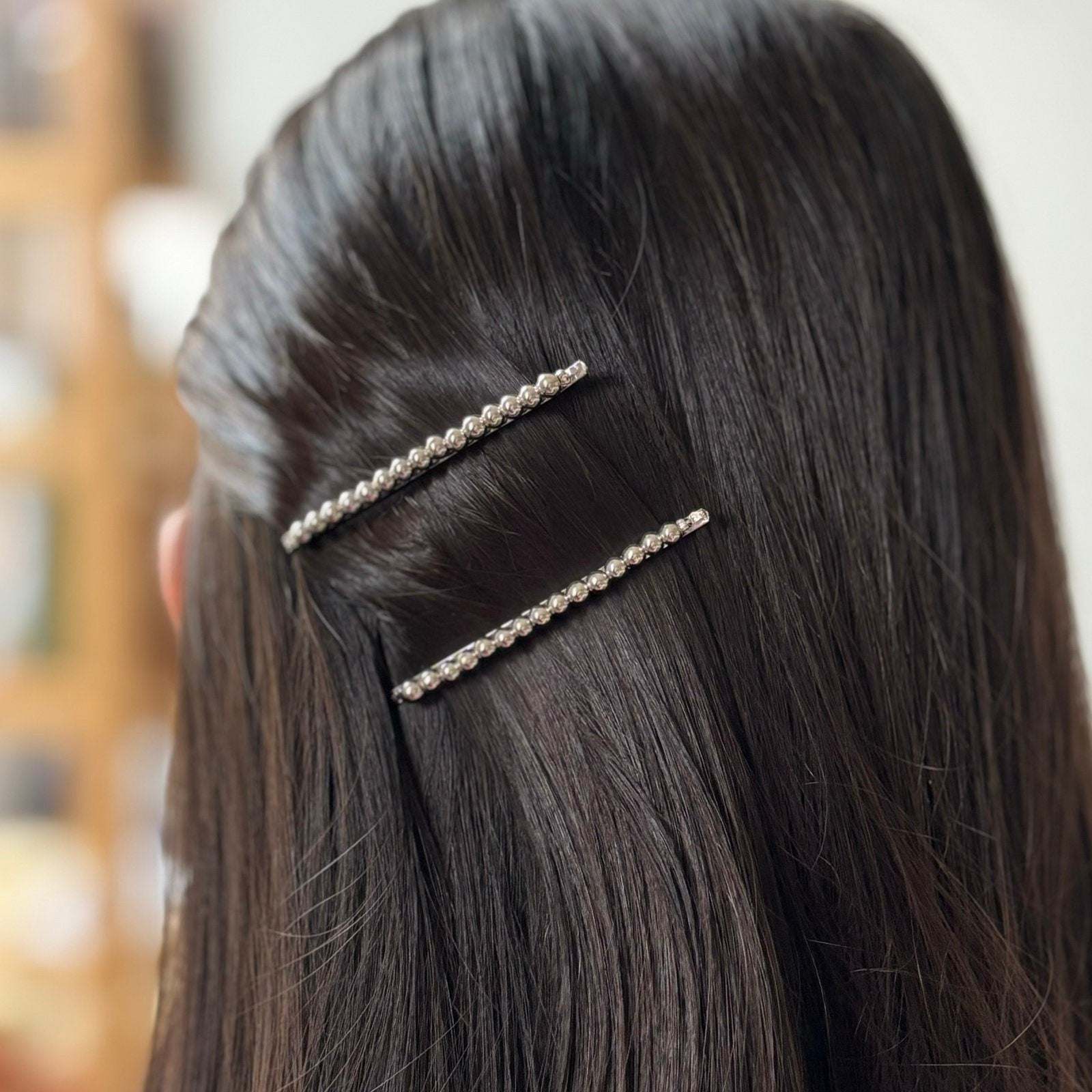 Pince cheveux fine motif torsadé et perles