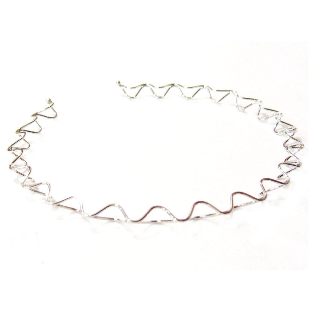 Serre tête fin en métal ondulé