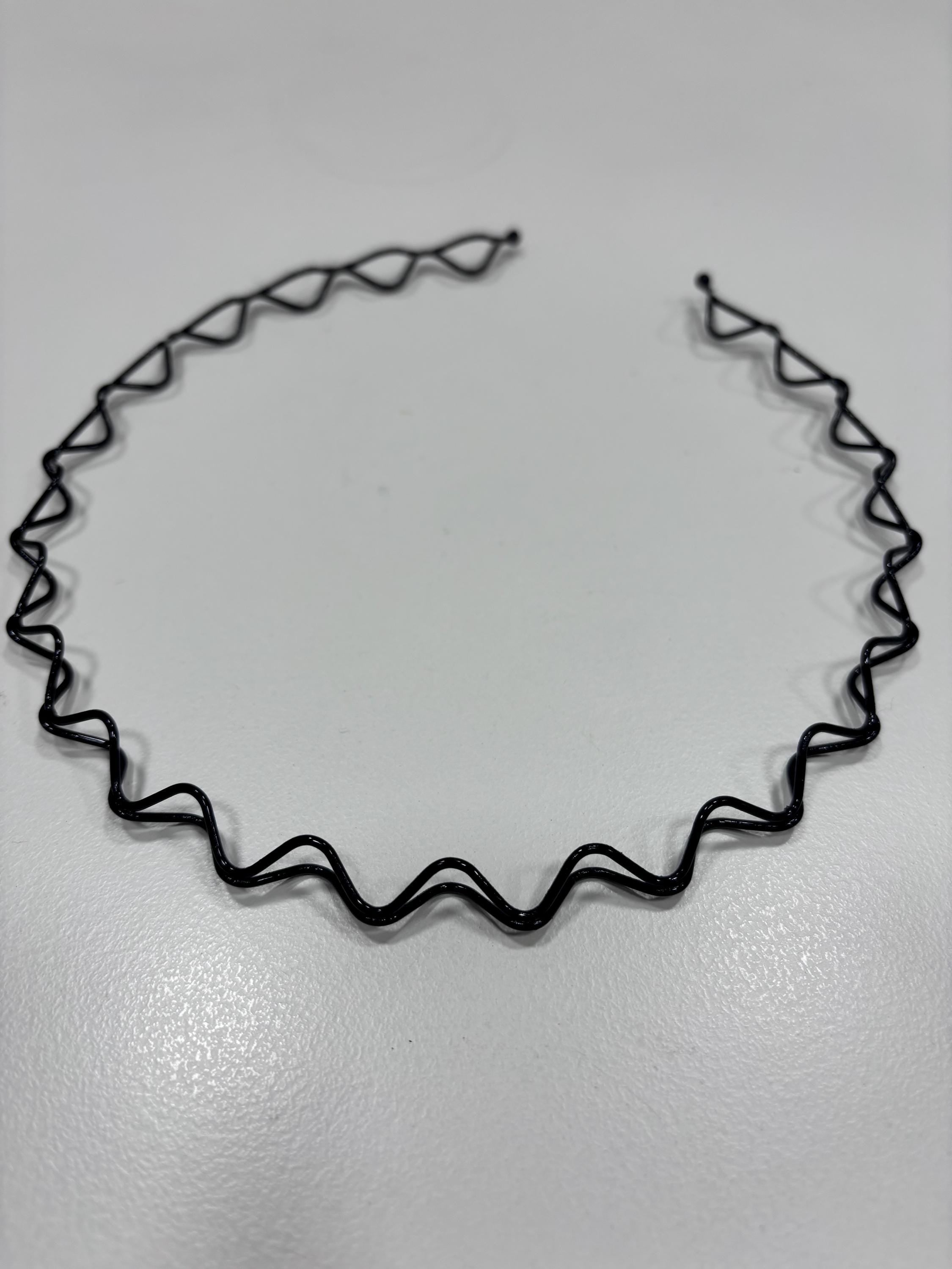 Serre tête fin en métal ondulé