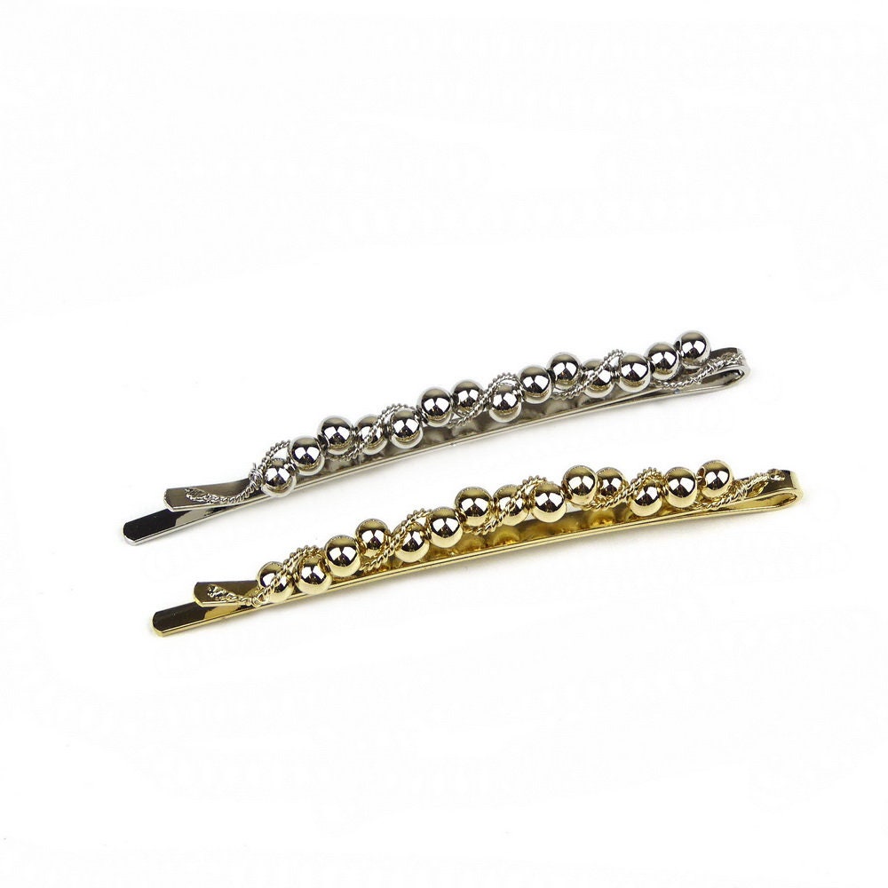 Pince cheveux motif torsadé et perles rondes