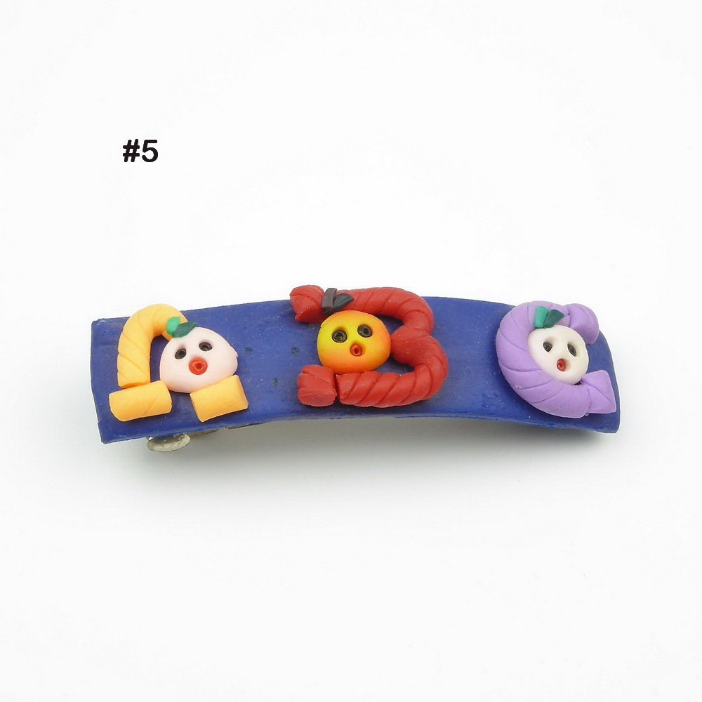 Barrette cheveux en polymère motif