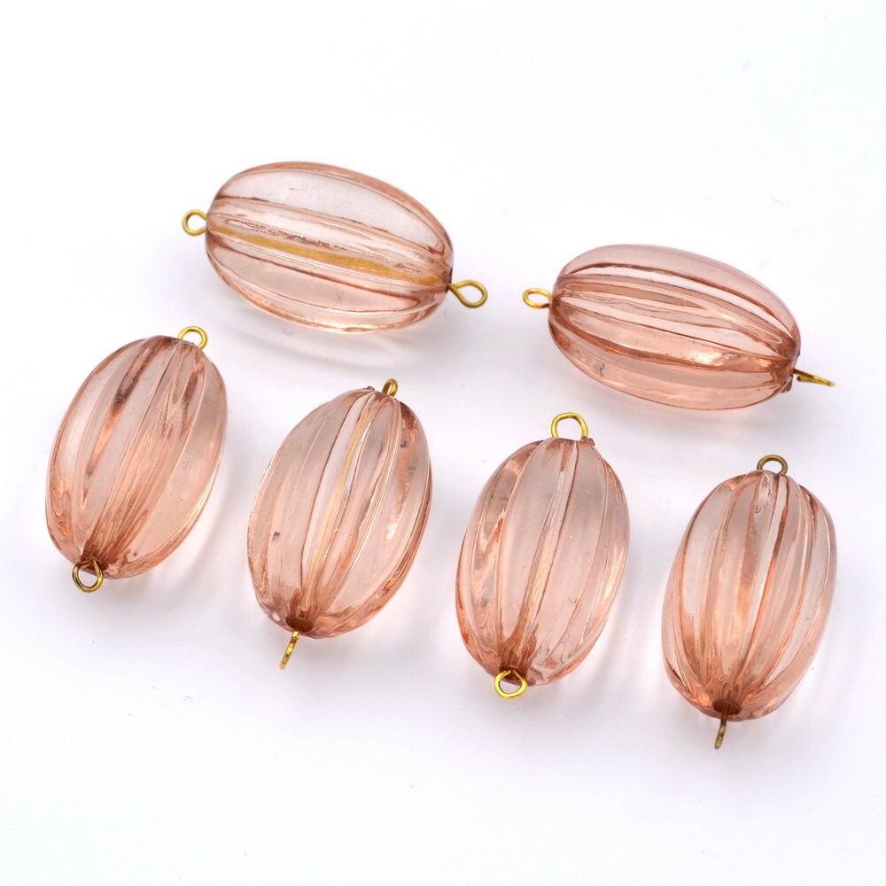 Lot de 10 perles ovales cannelées en acrylique 29x17mm  rose poudré