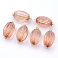 Lot de 10 perles ovales cannelées en acrylique 29x17mm  rose poudré