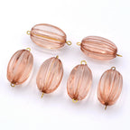 Lot de 10 perles ovales cannelées en acrylique 29x17mm  rose poudré