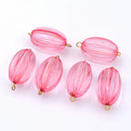 Lot de 10 perles ovales cannelées en acrylique 29x17mm  rose