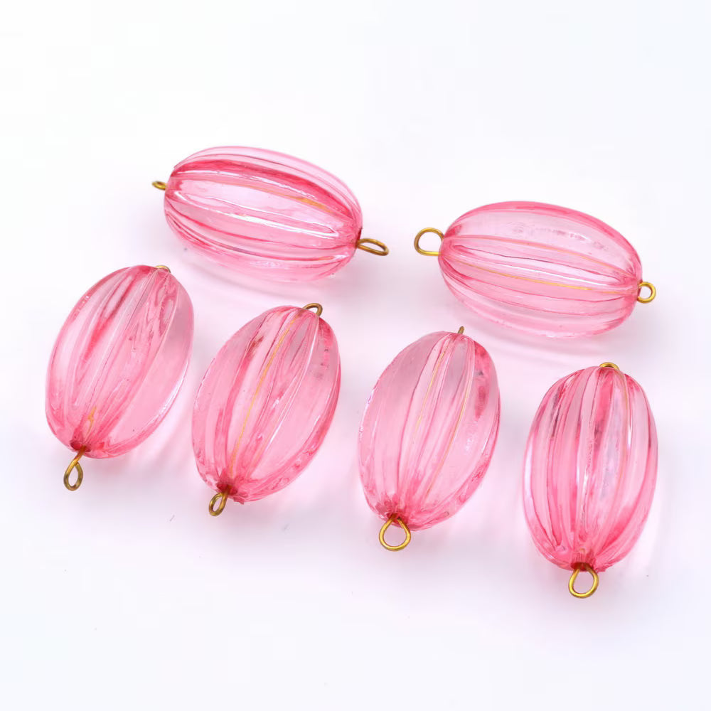 Lot de 10 perles ovales cannelées en acrylique 29x17mm  rose